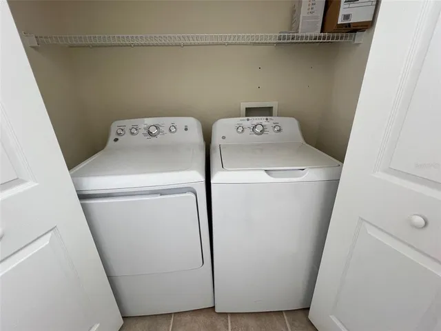 a view of a yard with a lake view