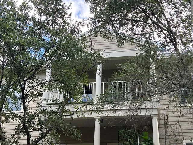 a view of street with parked cars