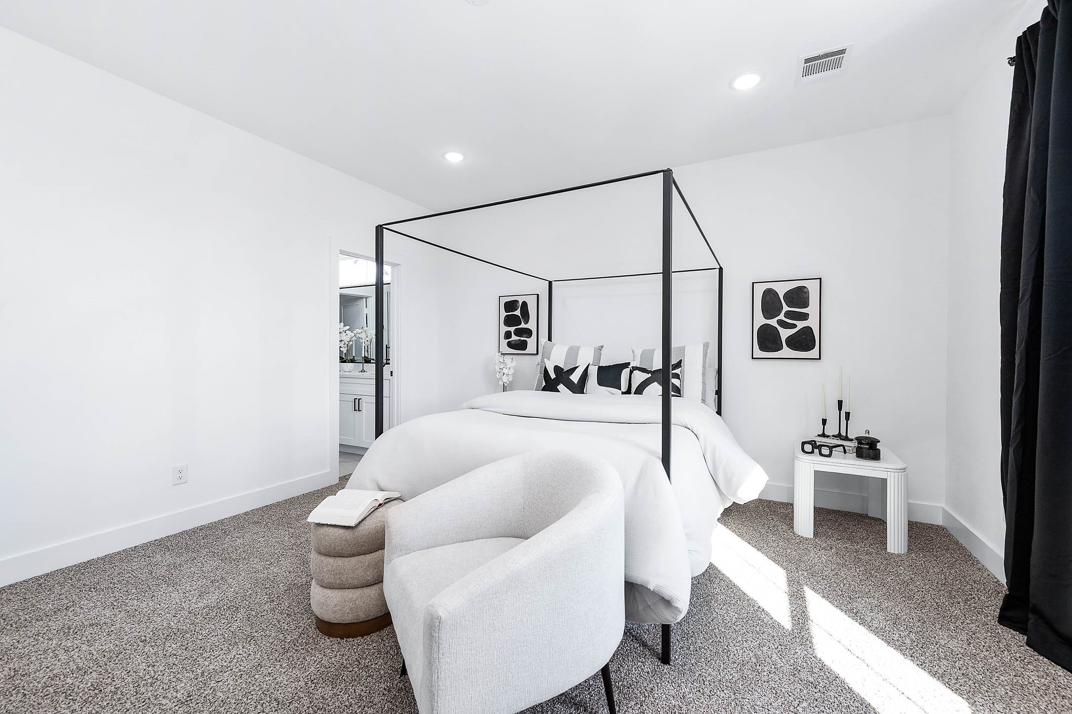 1515 Euel Street Houston, TX 77009 - Photo 25 of 34 Another view of the elegant primary bedroom highlighting its generous layout, large windows, and calming neutral palette that creates a true retreat-like atmosphere.