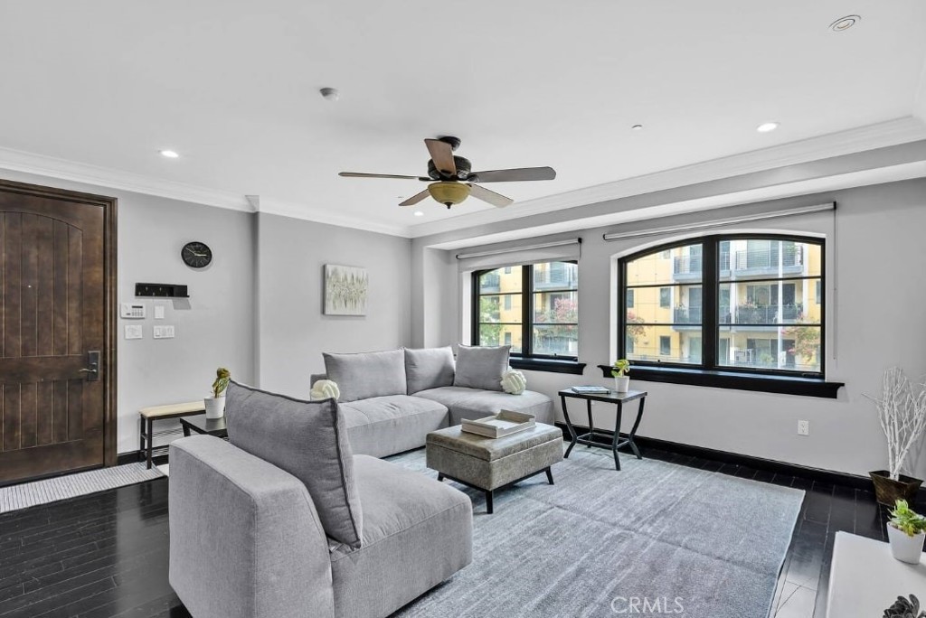 155 Cordova Street, Unit 203 Pasadena, CA 91105 - Photo 2 of 57 a living room with furniture and windows