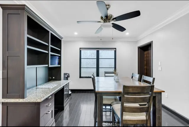 a large white bed in a bedroom