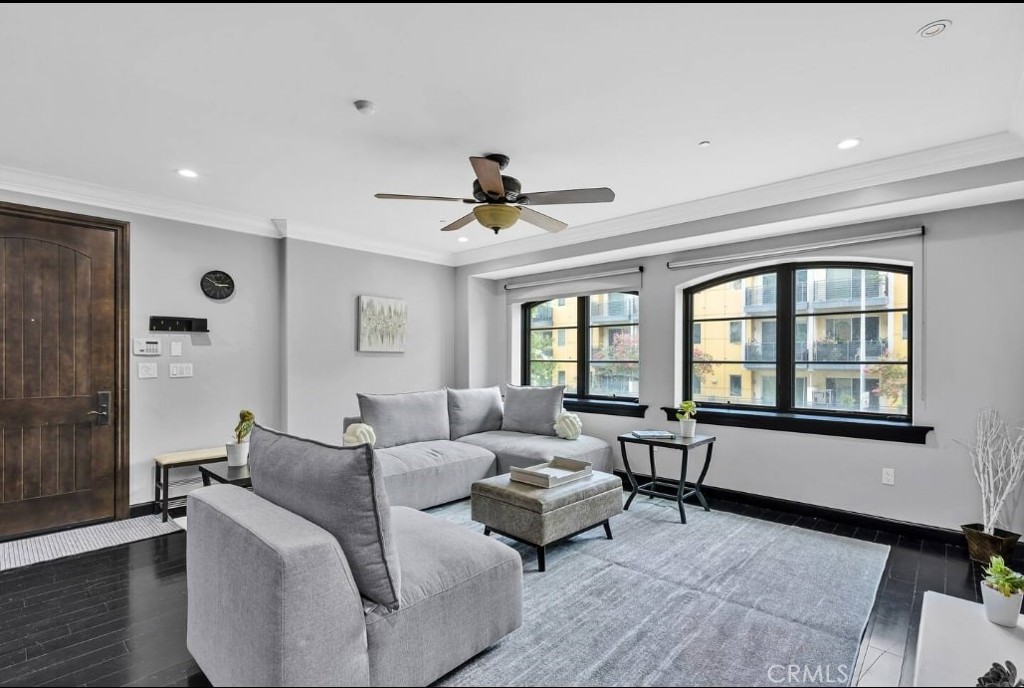 155 Cordova Street, Unit 203 Pasadena, CA 91105 - Photo 3 of 57 a living room with furniture and windows