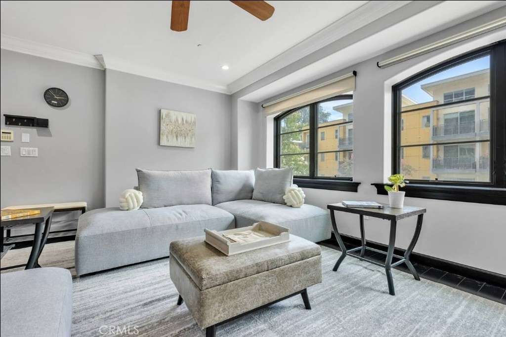 155 Cordova Street, Unit 203 Pasadena, CA 91105 - Photo 4 of 57 a living room with furniture and windows