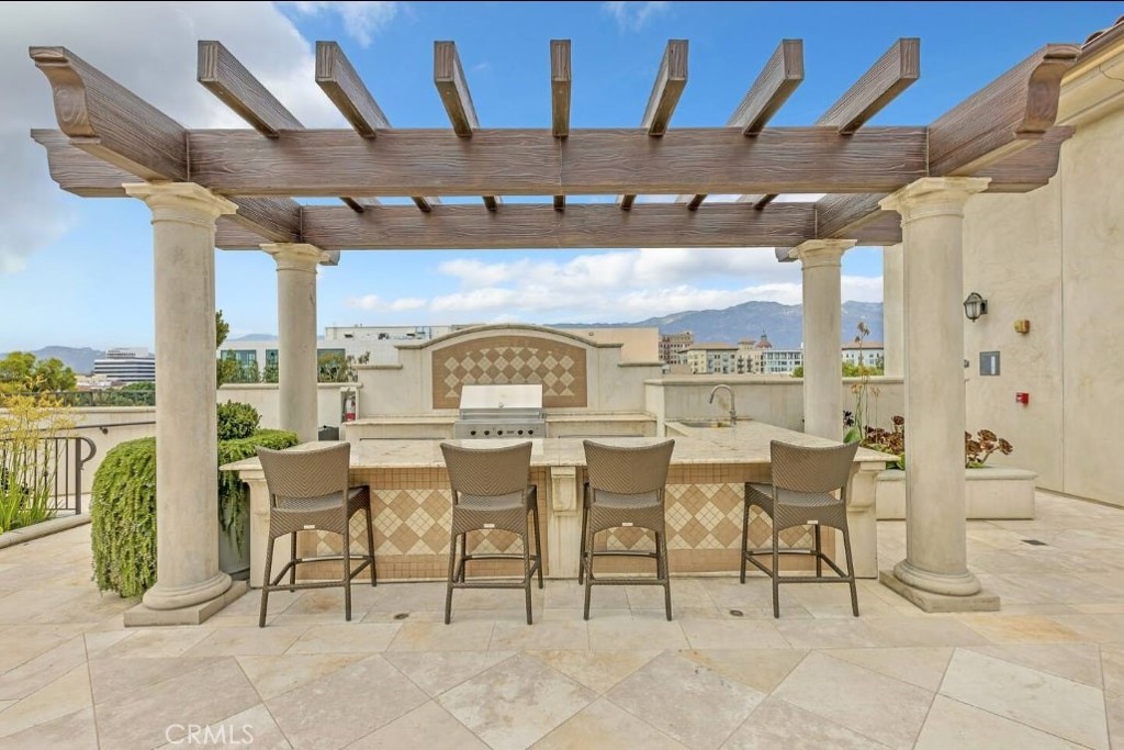 155 Cordova Street, Unit 203 Pasadena, CA 91105 - Photo 51 of 57 a view of a dining room with furniture
