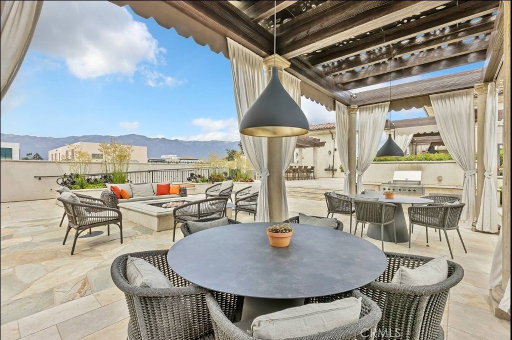 155 Cordova Street, Unit 203 Pasadena, CA 91105 - Photo 52 of 57 a outdoor dining space with furniture and outdoor view