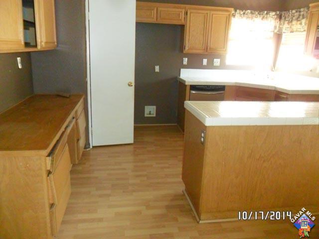 37604 Teal Street Palmdale, CA 93552 - Photo 3 of 10 a view of washer and dryer