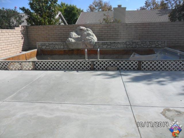 37604 Teal Street Palmdale, CA 93552 - Photo 8 of 10 a front view of a house with parking