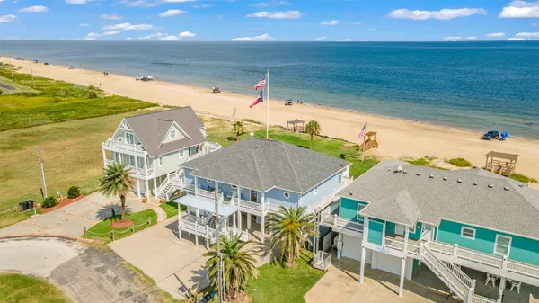 a aerial view of a house with a swimming pool