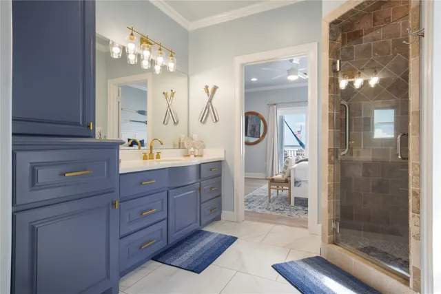 a bathroom with a bathtub and a window