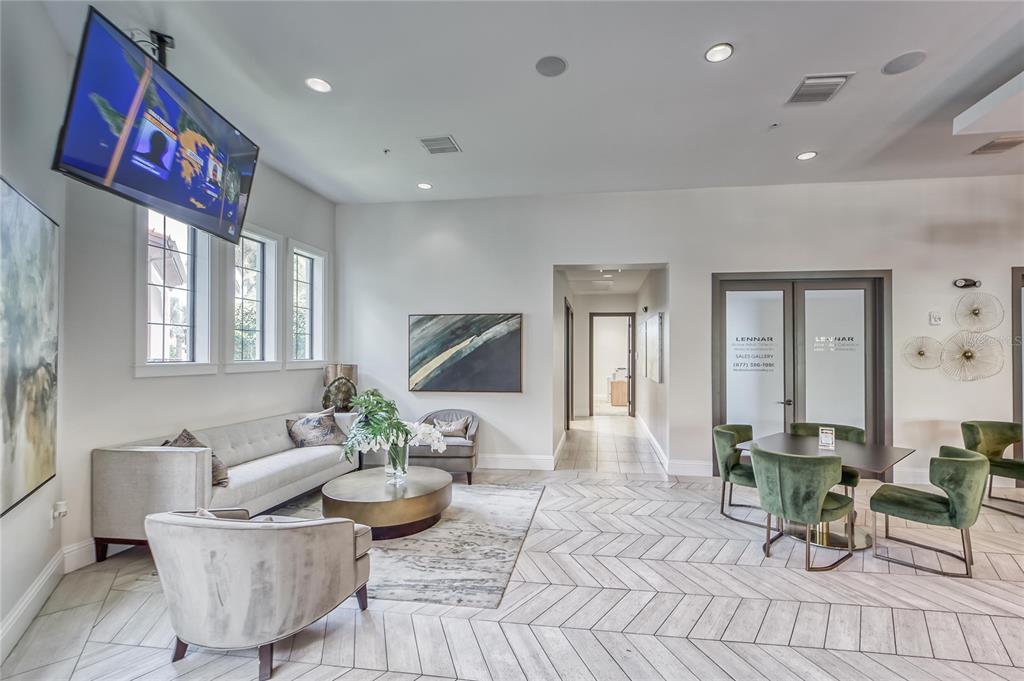 16909 April Plush Drive Wimauma, FL 33598 - Photo 56 of 89 a living room with furniture and wooden floor