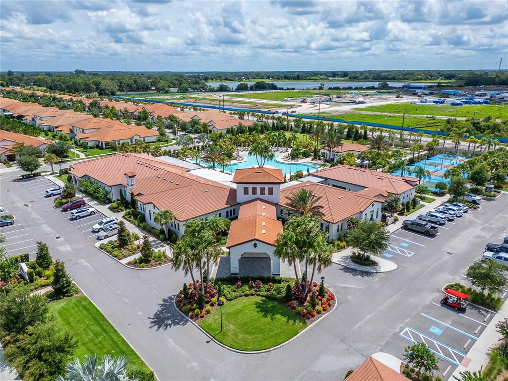 16909 April Plush Drive Wimauma, FL 33598 - Photo 66 of 89 an aerial view of residential houses with outdoor space and lake view