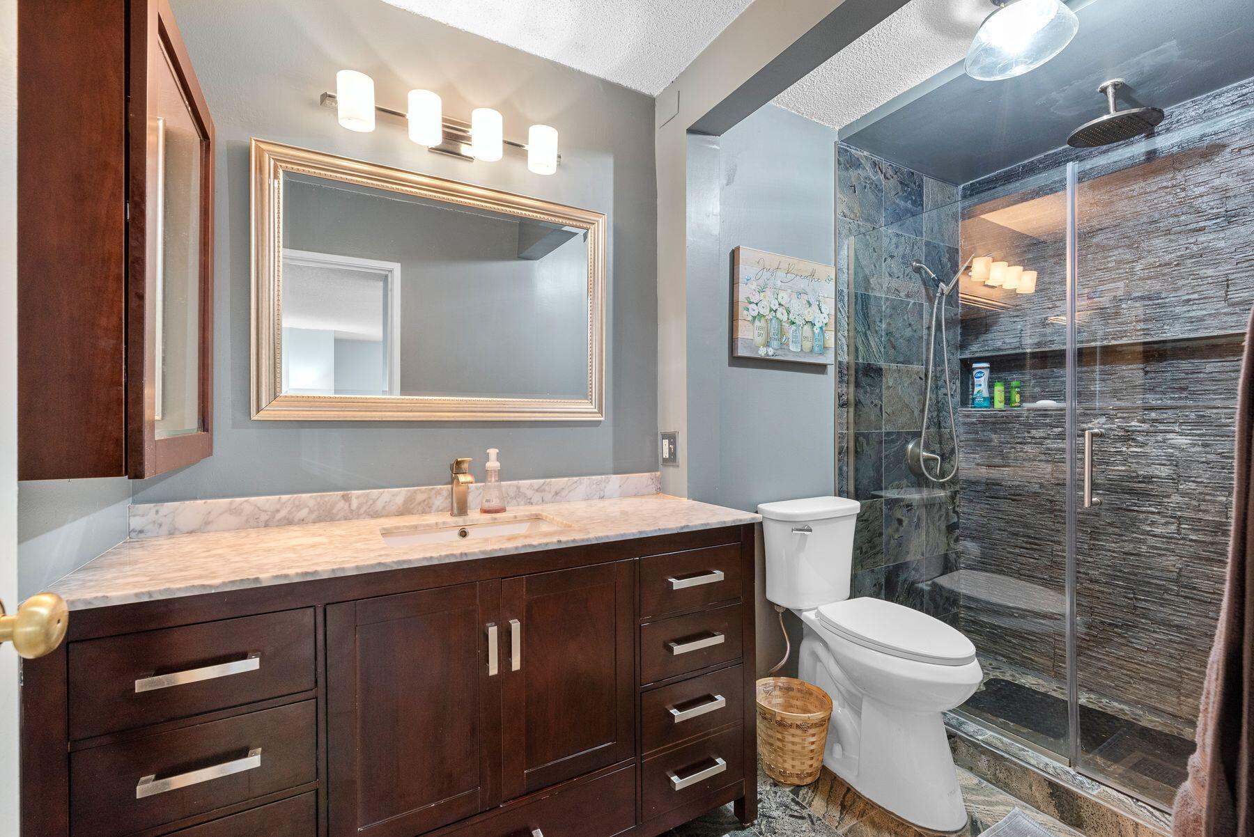 1660 North Prospect Avenue, Unit 1207 Milwaukee, WI 53202 - Photo 11 of 14 Primary Ensuite