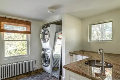 a view of kitchen and sink