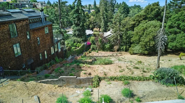 an aerial view of residential house with outdoor space