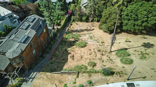 a view of a backyard of the house