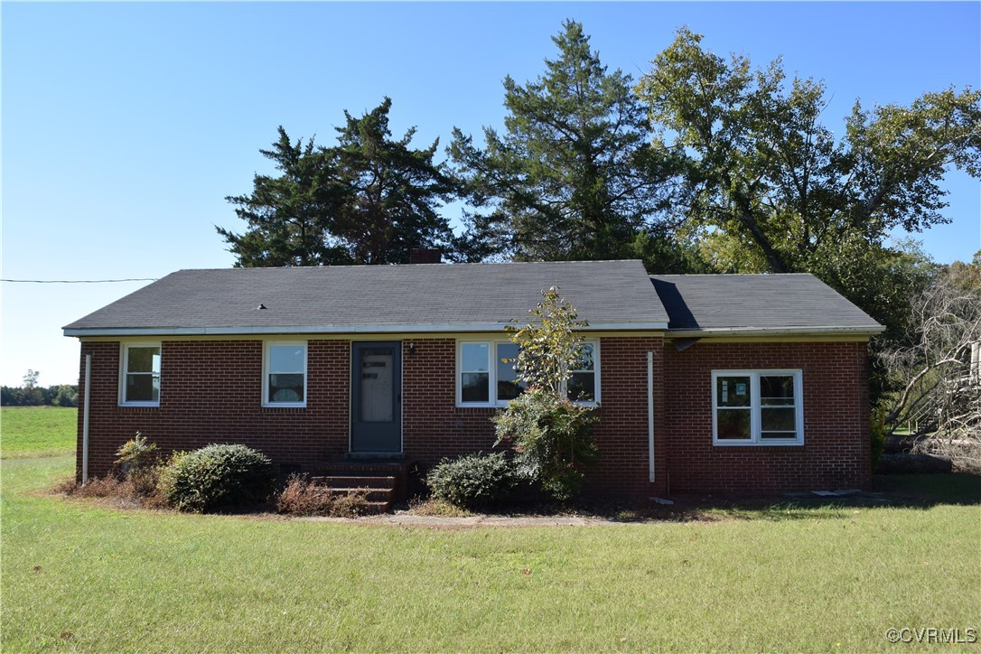 1102 Aberdour Road Jarratt, VA 23867 - Photo 2 of 10 View of front facade with a front yard
