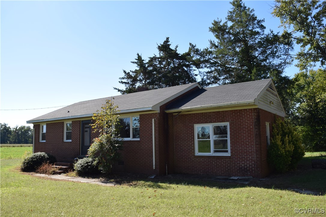 1102 Aberdour Road Jarratt, VA 23867 - Photo 3 of 10 Ranch-style home with a front yard