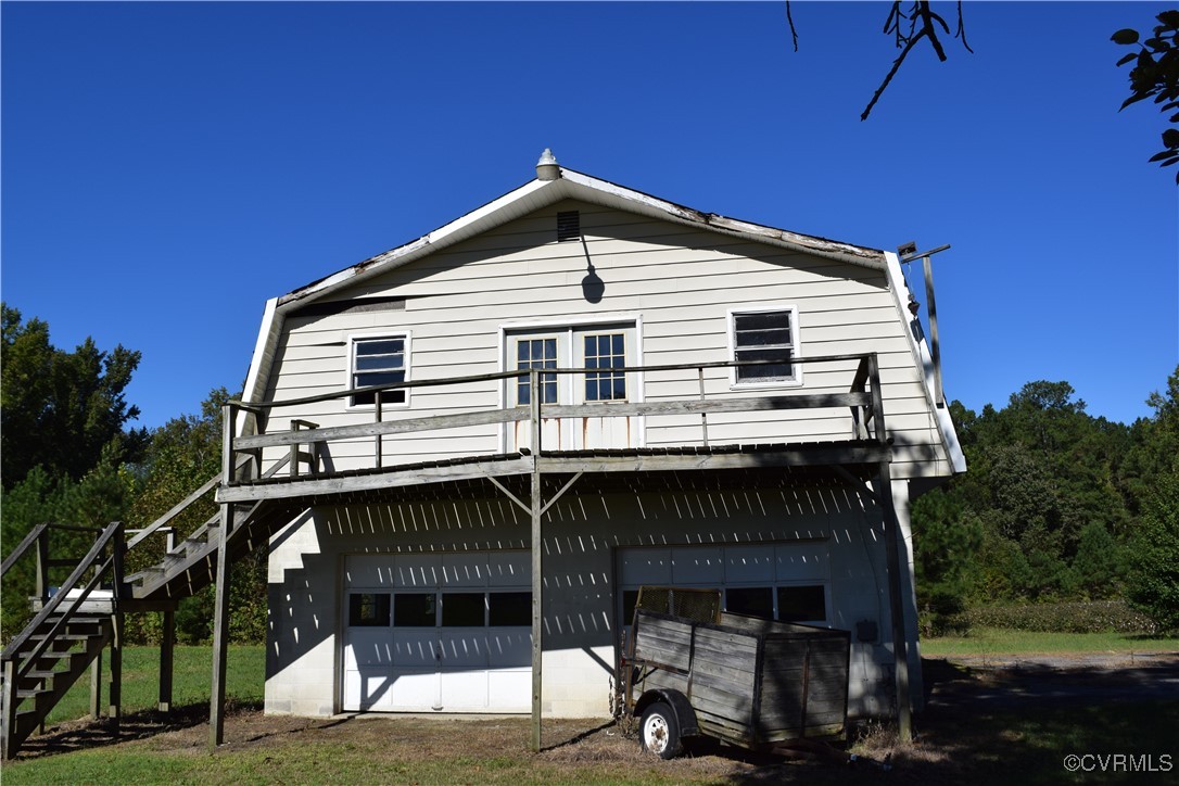 1102 Aberdour Road Jarratt, VA 23867 - Photo 5 of 10 Back of property featuring a garage