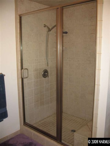 17585 Parrot Drive Reno, NV 89508 - Photo 9 of 9 a bathroom with a shower