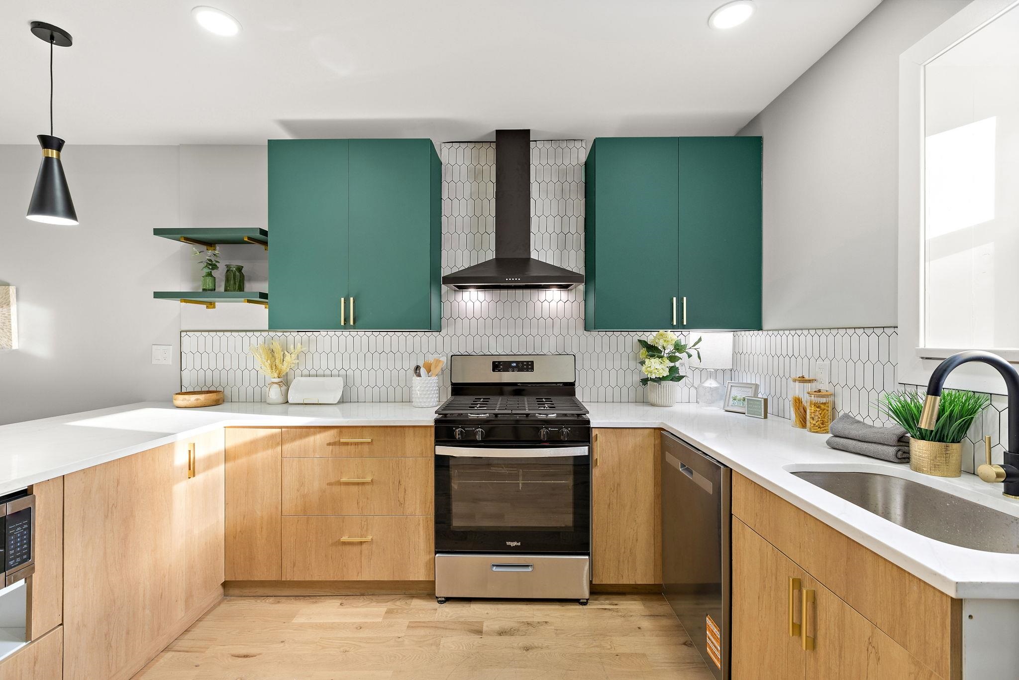 77 Boyd Avenue Jersey City, NJ 07304 - Photo 17 of 26 a kitchen with a stove and a sink