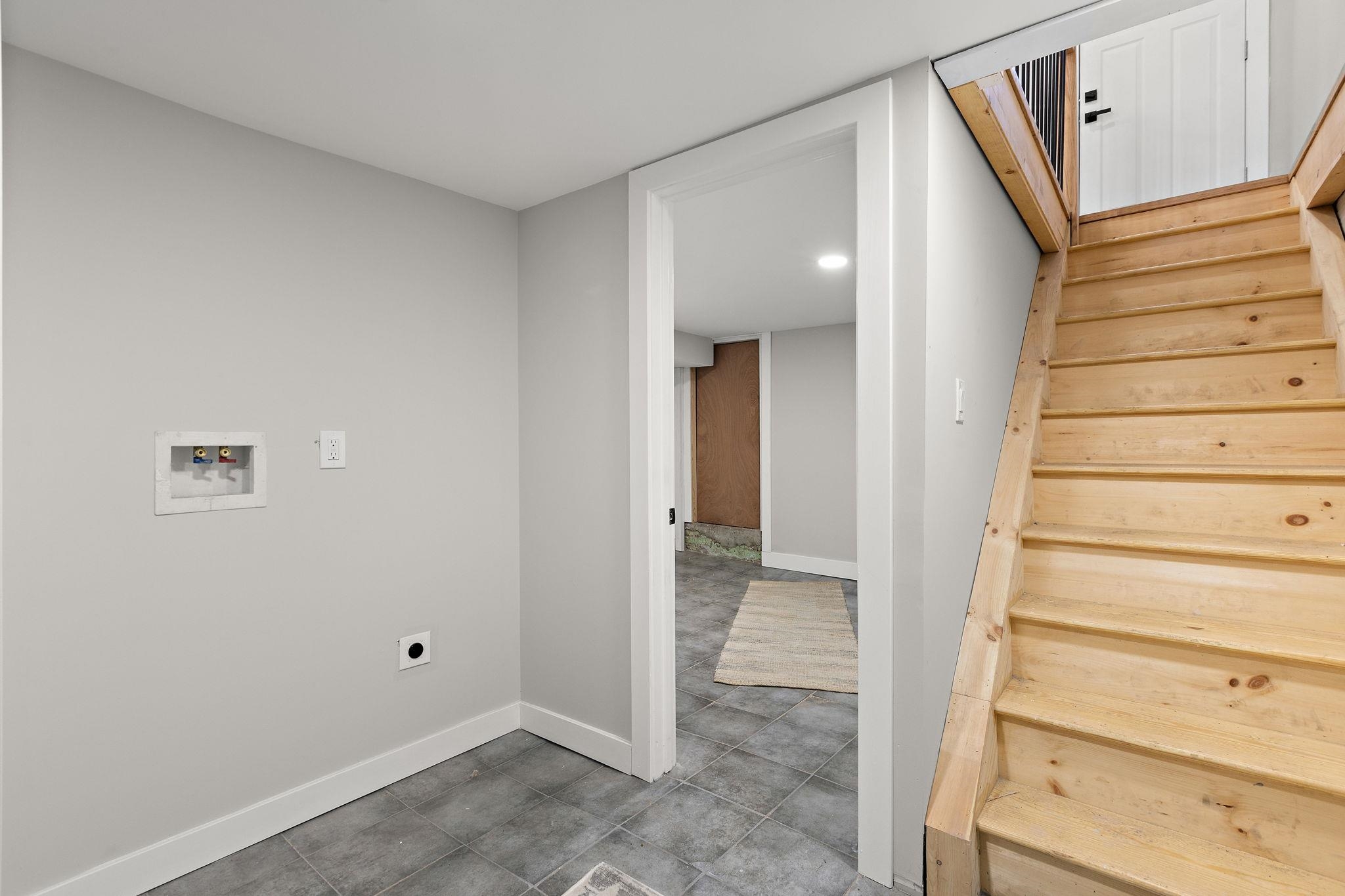 77 Boyd Avenue Jersey City, NJ 07304 - Photo 4 of 26 a view of an entryway with staircase