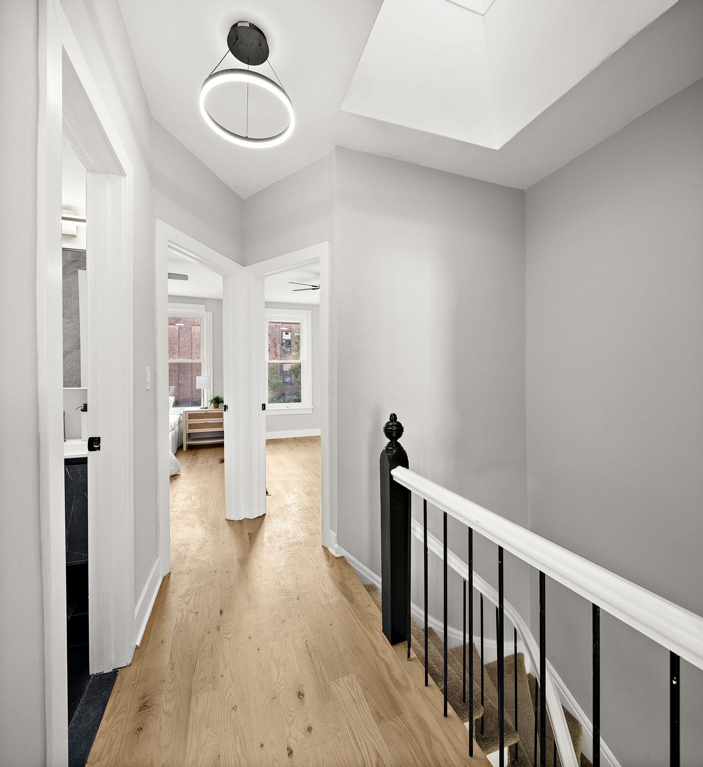 77 Boyd Avenue Jersey City, NJ 07304 - Photo 5 of 26 a bathroom with a sink and a mirror