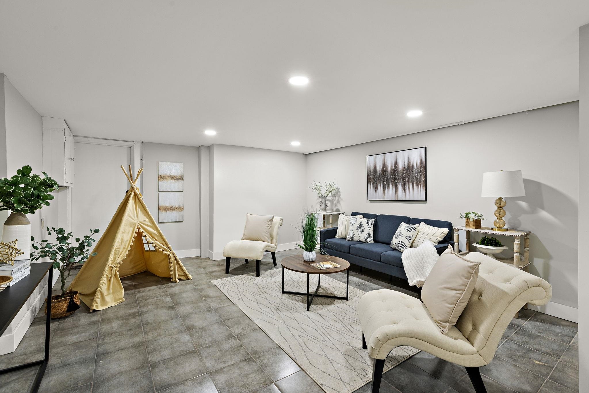 77 Boyd Avenue Jersey City, NJ 07304 - Photo 6 of 26 a living room with furniture and wooden floor