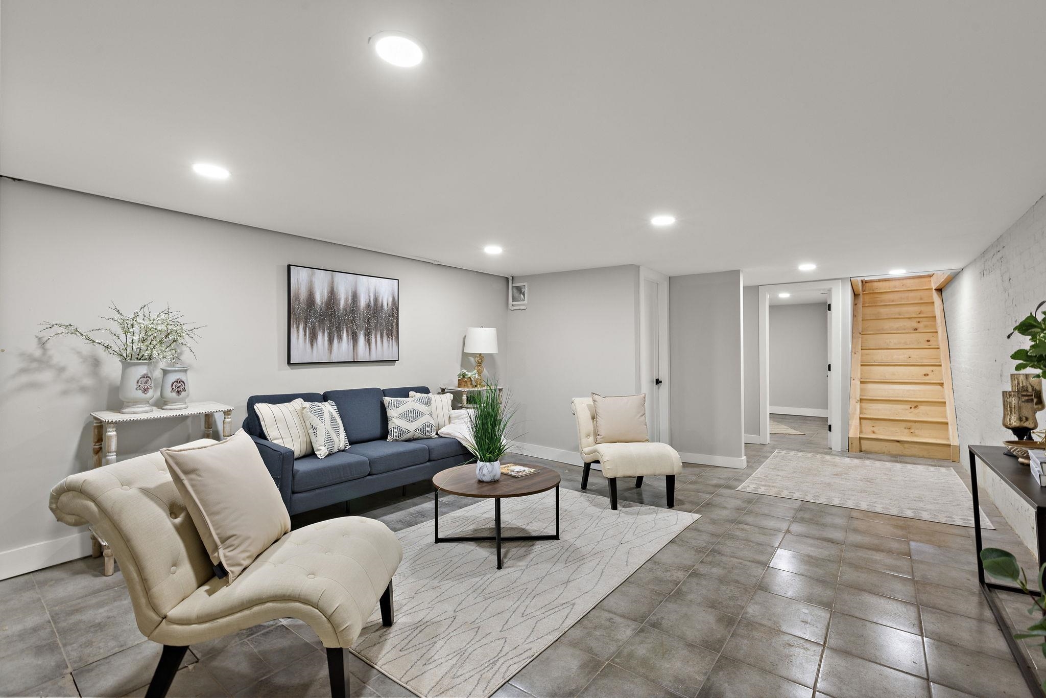 77 Boyd Avenue Jersey City, NJ 07304 - Photo 7 of 26 a living room with furniture and wooden floor