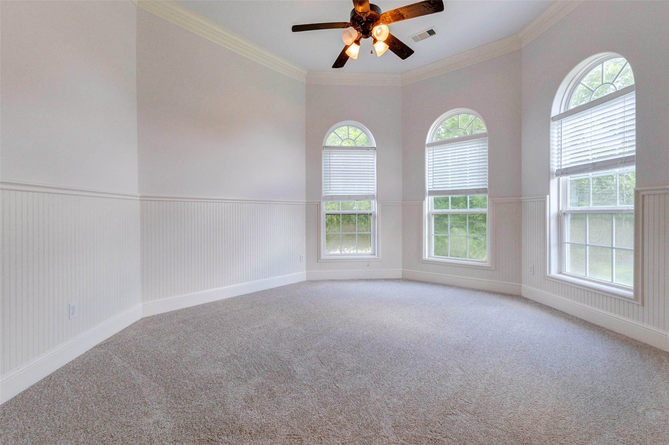 5327 Whitmore Fulshear, TX 77441 - Photo 32 of 50 Another spacious secondary bedroom offers plush carpeting, abundant natural light, and a flexible layout to suit a variety of needs.