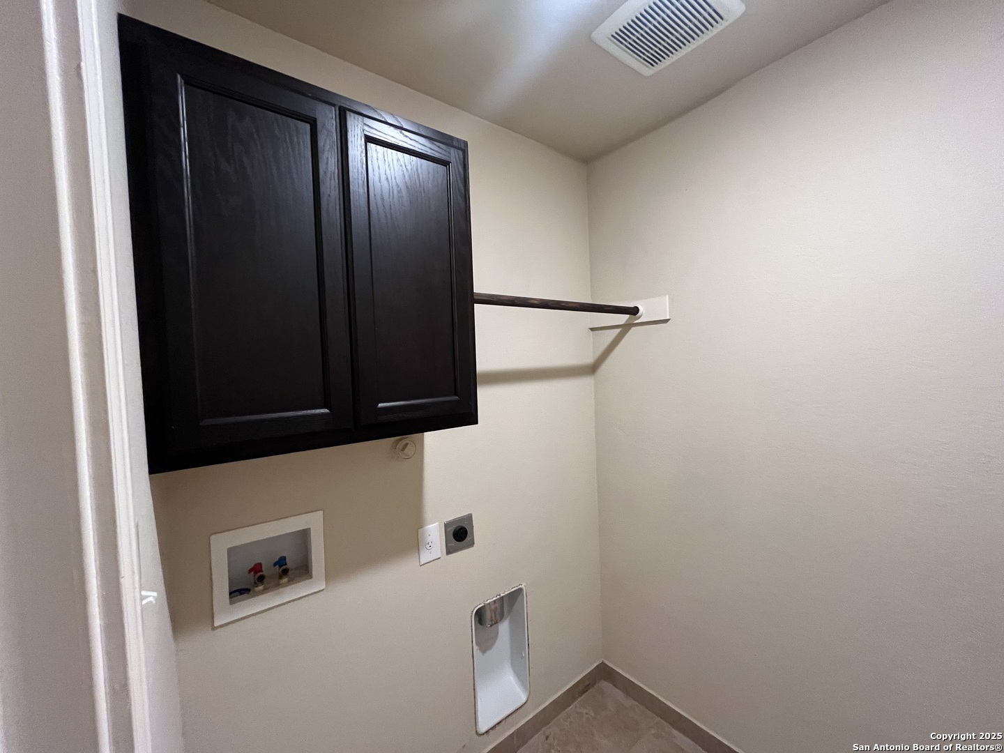 6530 Marcel Way, Unit 103 San Antonio, TX 78233 - Photo 13 of 31 a bathroom with a sink and a mirror