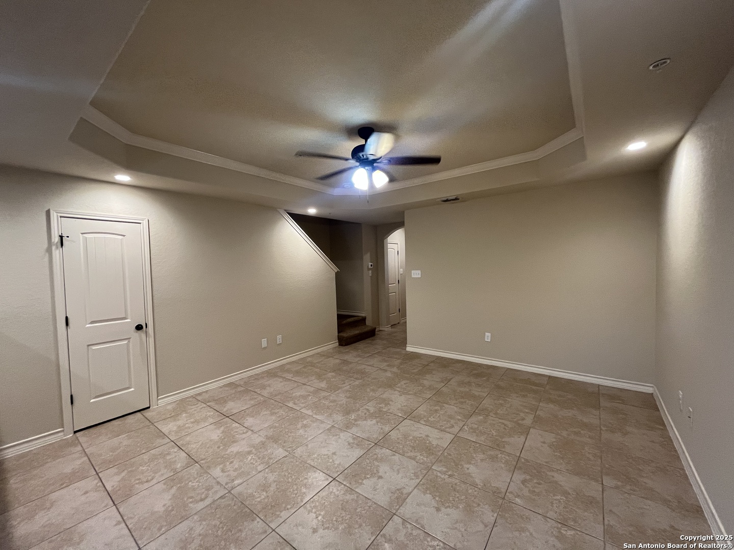 6530 Marcel Way, Unit 103 San Antonio, TX 78233 - Photo 4 of 31 a view of an empty room and chandelier fan