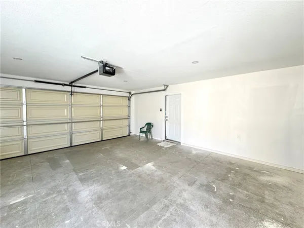 a view of a small space in front of a house