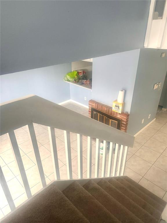 5084 Downing Street, Unit 2 Orlando, FL 32839 - Photo 6 of 7 a view of an empty room and window