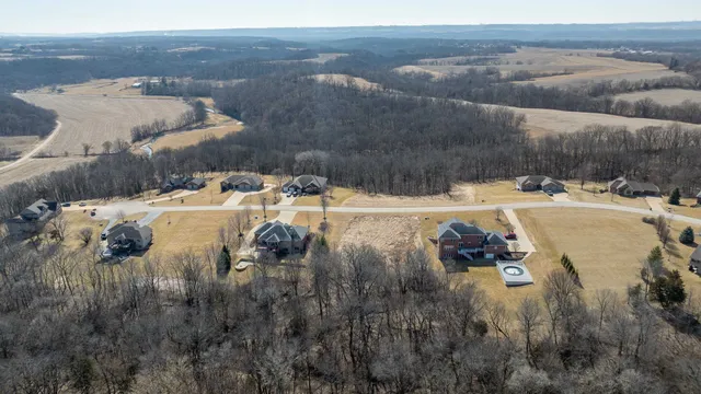 a view of a backyard of a house