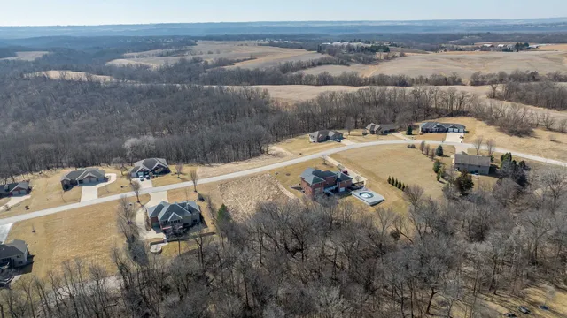 a view of a backyard of a house
