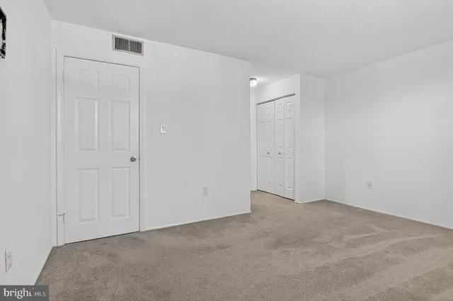 a view of a room with racks on the wall