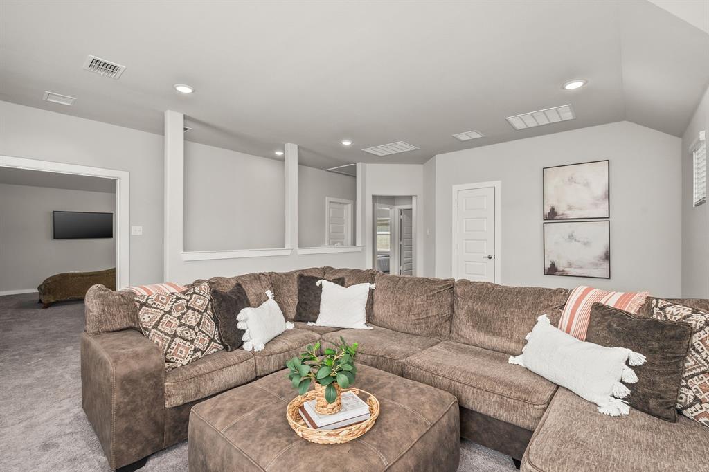4017 Mapleleaf Pass Melissa, TX 75454 - Photo 20 of 32 a living room with furniture and a couch