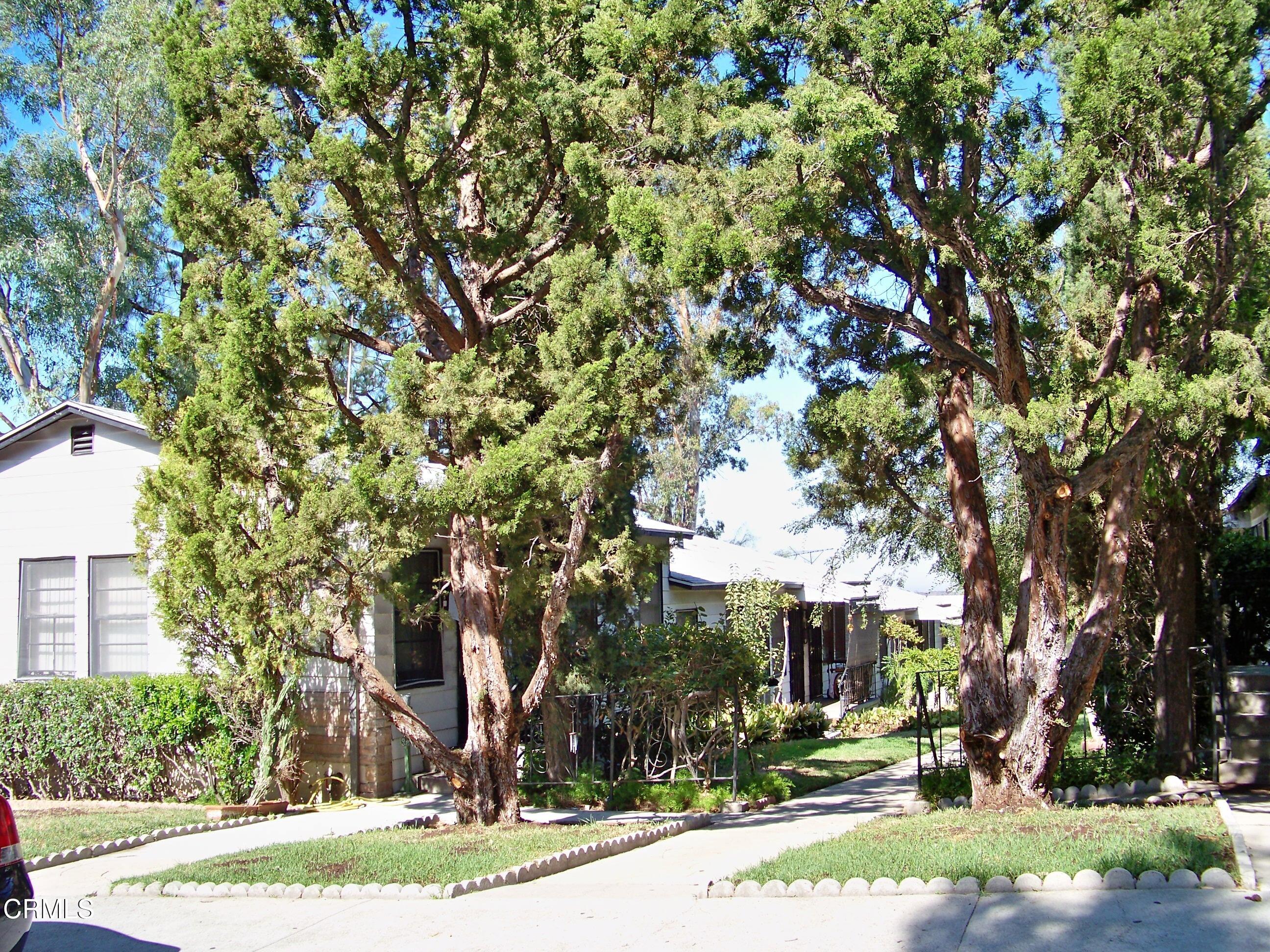 10155 Silverton Avenue, Unit 3 Tujunga, CA 91042 - Photo 2 of 4 a front view of a house with a yard