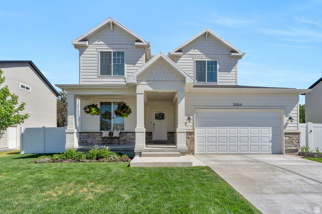 2664 West Maple Street Mapleton, UT 84664 - Photo 41 of 49 Contemporary two-story exterior with light-colored siding and a stone facade accent