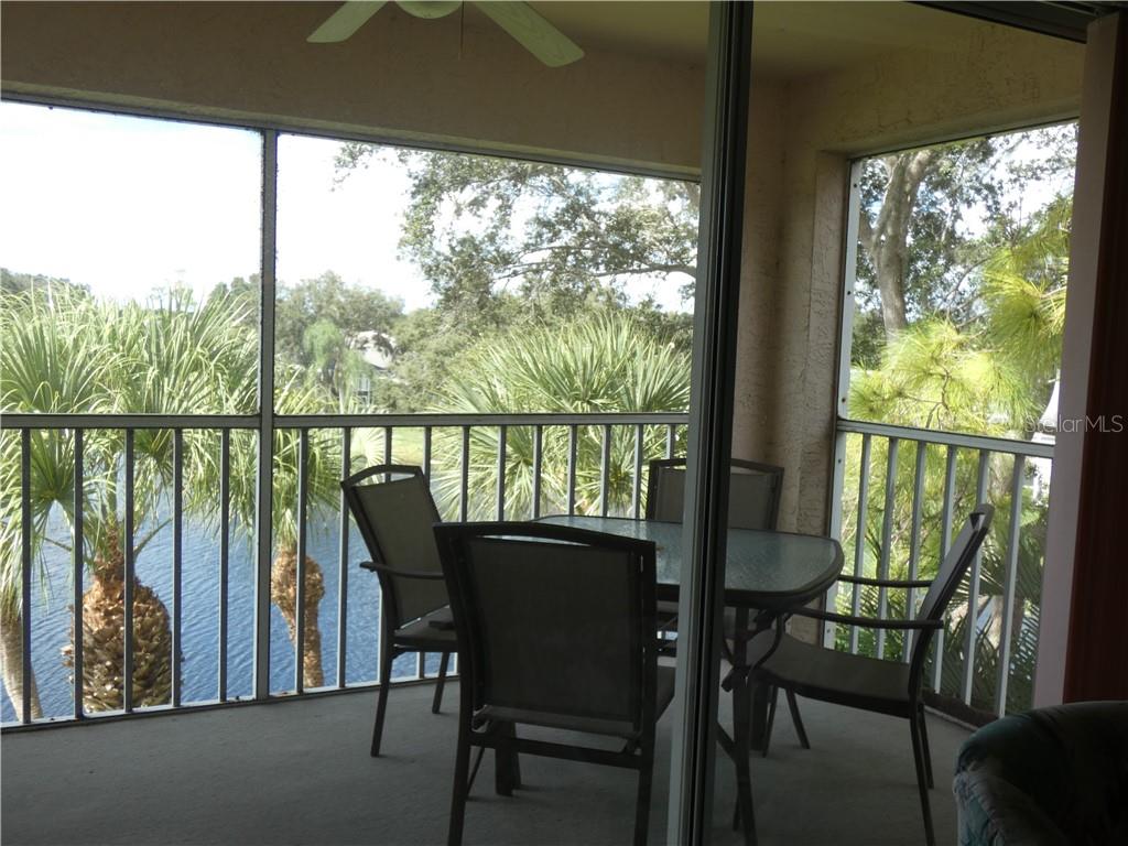 9300 Clubside Circle, Unit 1307 Sarasota, FL 34238 - Photo 22 of 40 a view of a city from a balcony