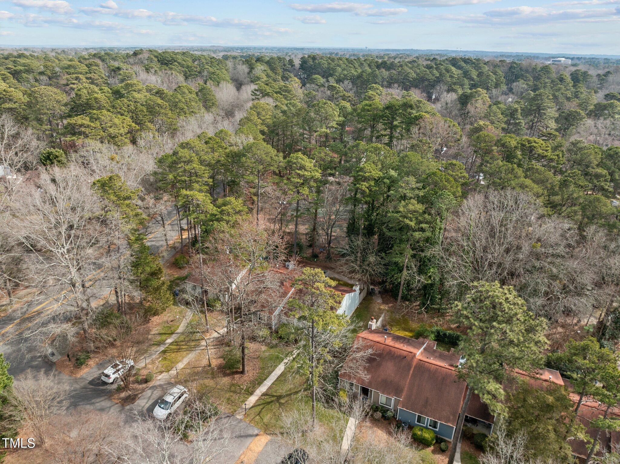 5850 Branchwood Road Raleigh, NC 27609 - Photo 26 of 27 a view of outdoor space and a yard