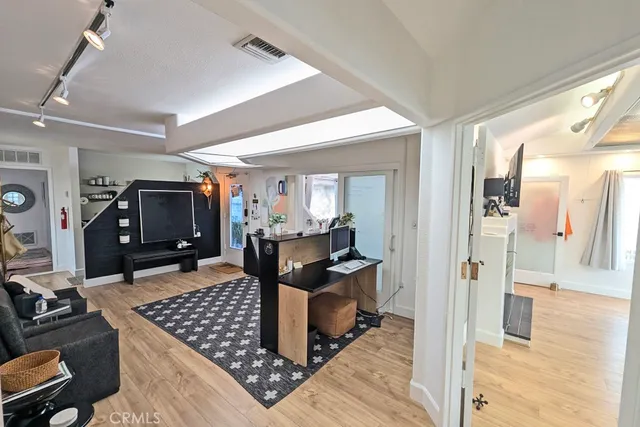 a workspace with furniture and a window