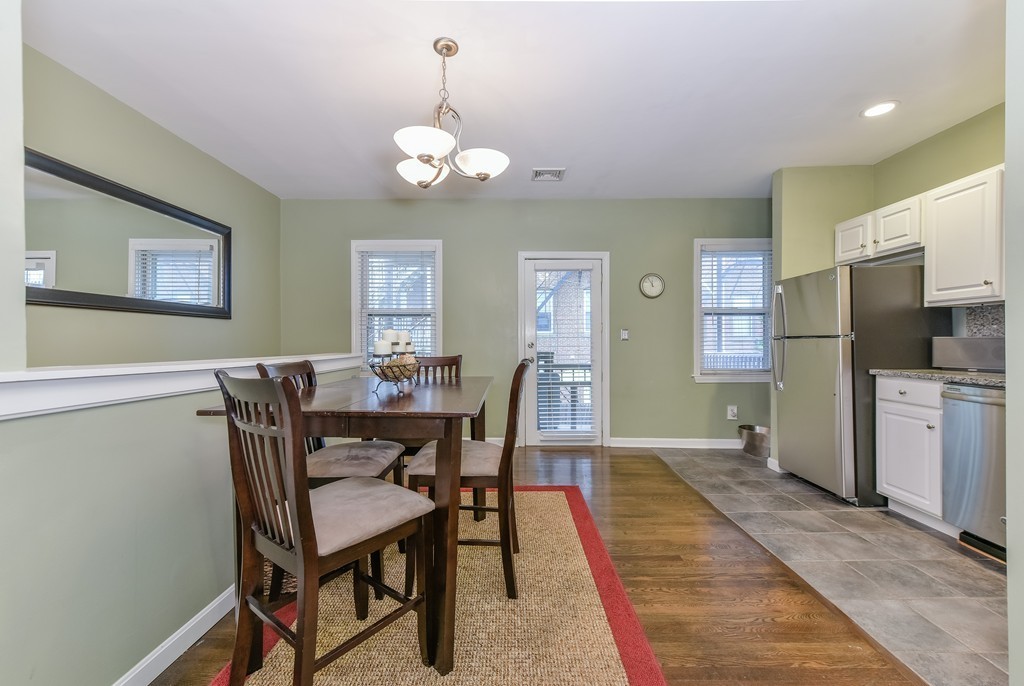 253 Gold Street, Unit 1 Boston, MA 02127 - Photo 3 of 19 a view of a dining room with furniture