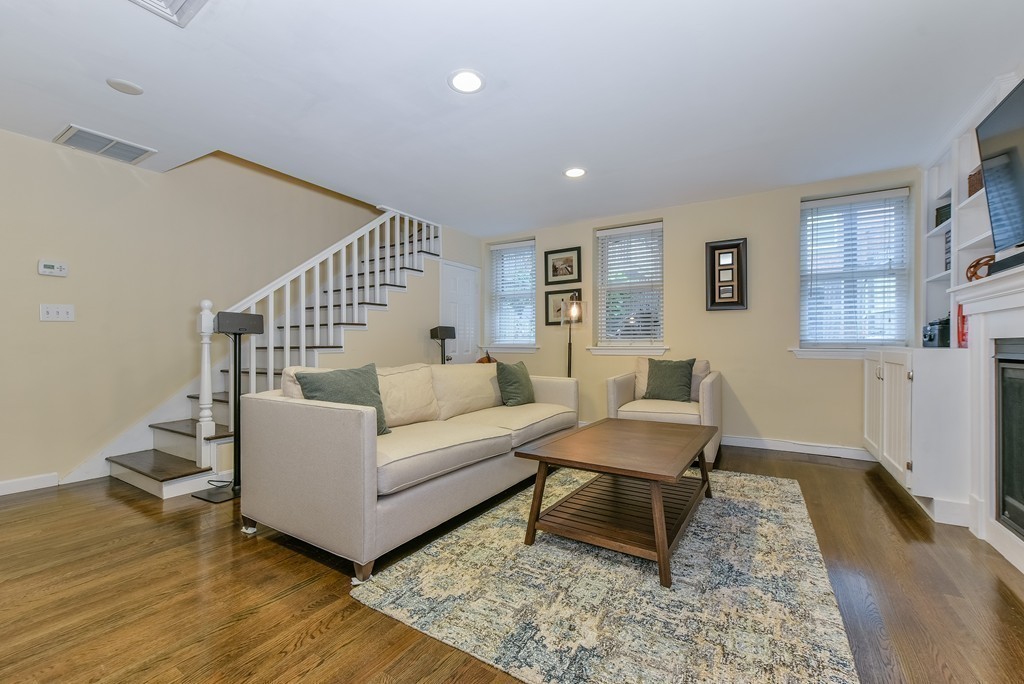 253 Gold Street, Unit 1 Boston, MA 02127 - Photo 8 of 19 a living room with furniture and wooden floor