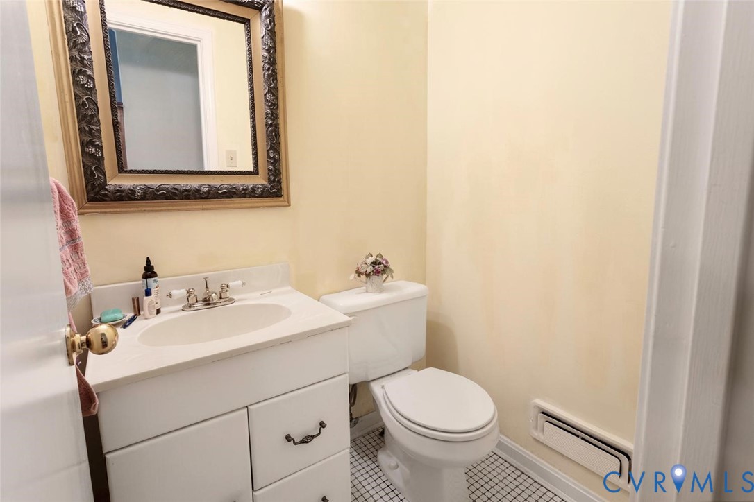 10260 Maplested Lane Henrico, VA 23229 - Photo 18 of 38 Bathroom featuring a white vanity with integrated