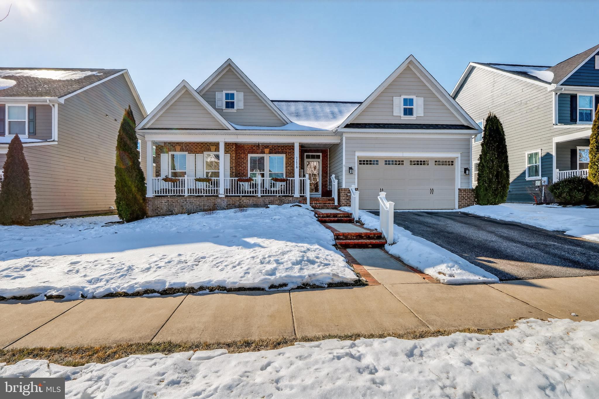 17518 Spring Cress Drive Dumfries, VA 22026 - Photo 1 of 37 a front view of a house with garden
