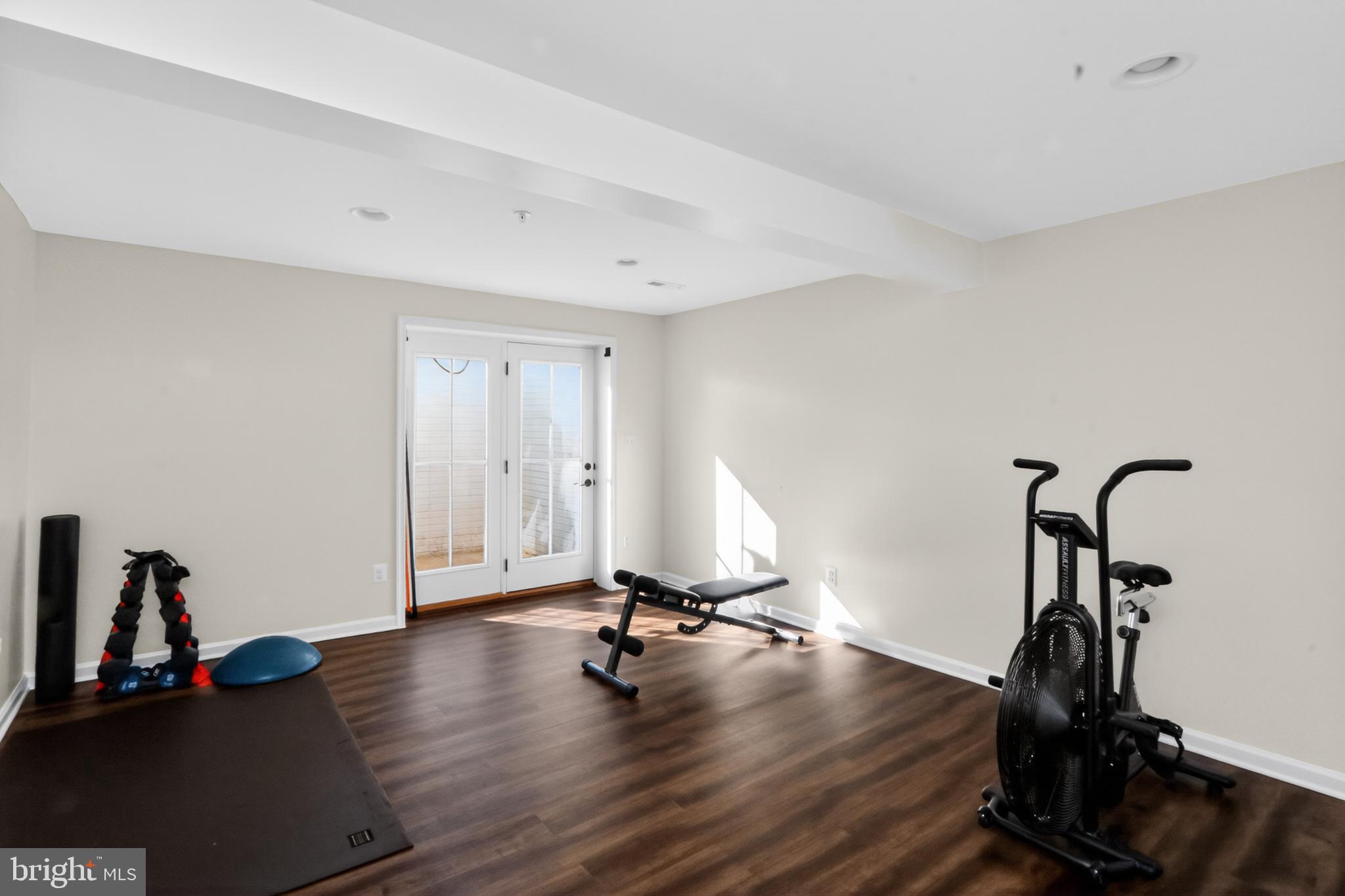 17518 Spring Cress Drive Dumfries, VA 22026 - Photo 20 of 37 a view of a room with gym equipment