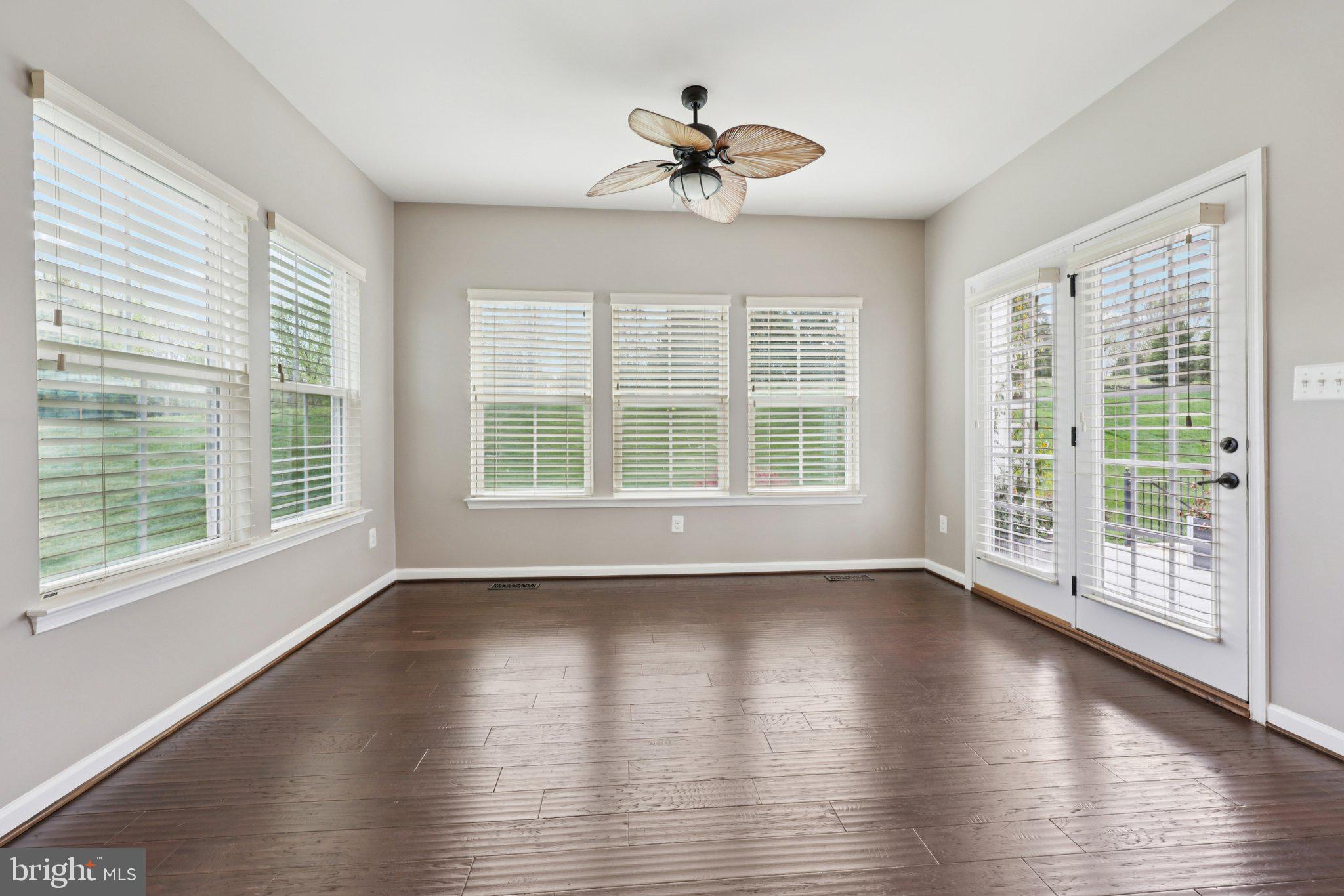17518 Spring Cress Drive Dumfries, VA 22026 - Photo 34 of 89 a view of an empty room with wooden floor and a window