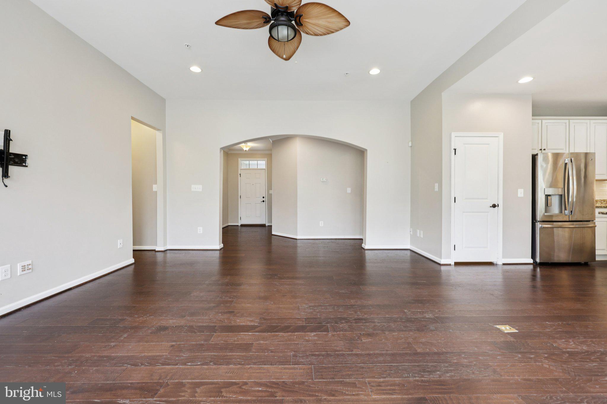 17518 Spring Cress Drive Dumfries, VA 22026 - Photo 40 of 89 a view of an empty room with a window and wooden floor