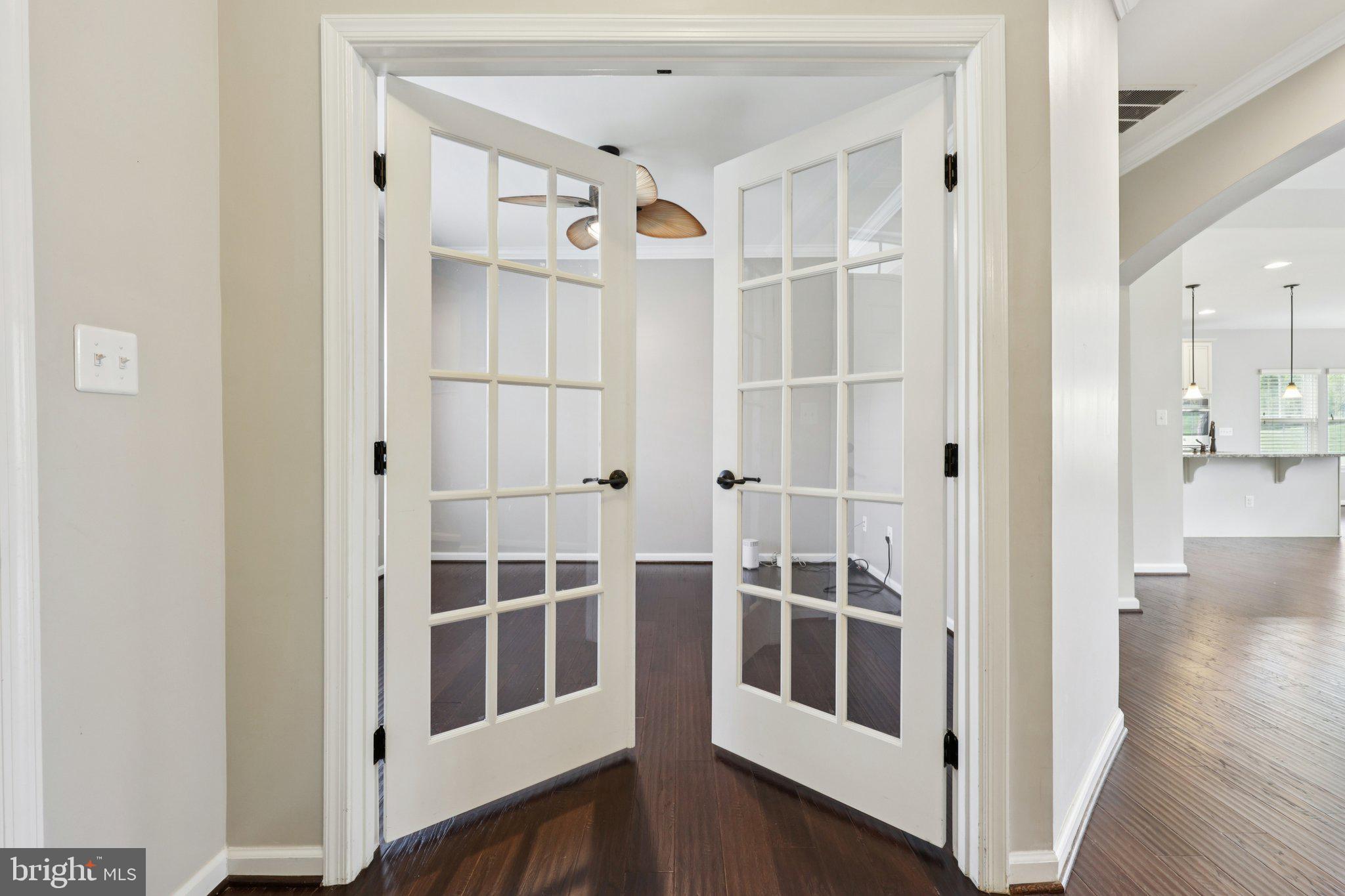 17518 Spring Cress Drive Dumfries, VA 22026 - Photo 42 of 89 a view of walk in closet with wooden floor and windows